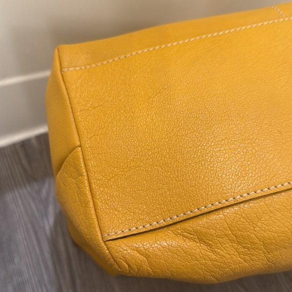 Dooney and Bourke Yellow Zippered Hobo Bag with Gold Embellishments - Picture 10 of 12